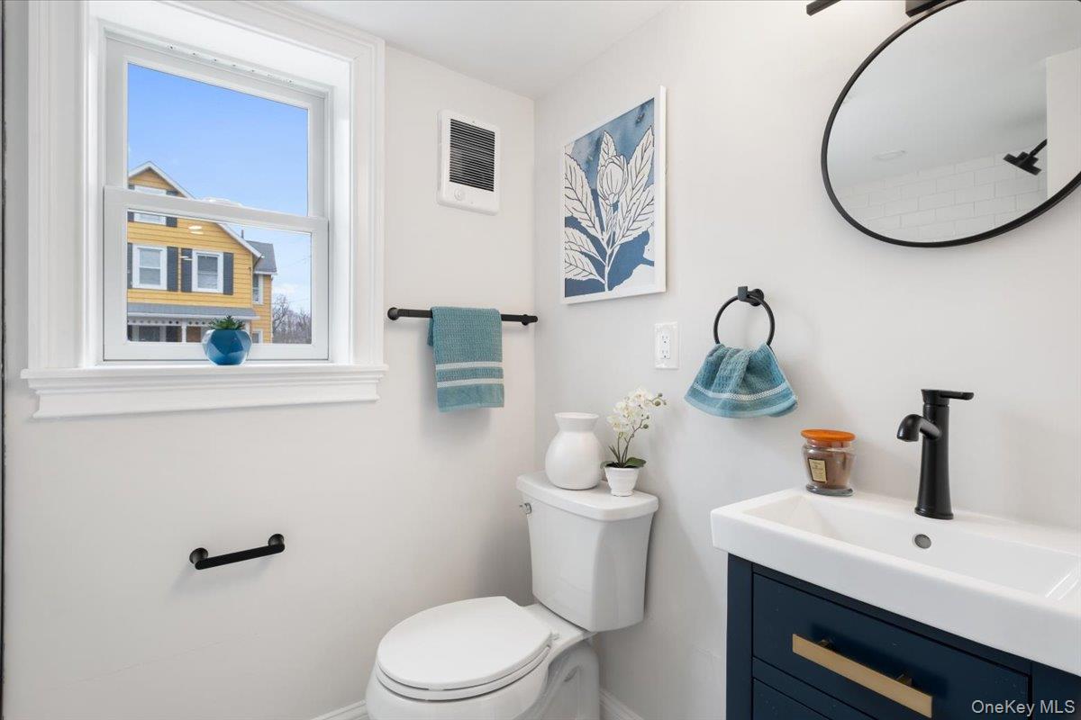 32 Ackerman Street Beacon, NY 12508 - Photo 38 of 50 a bathroom with a toilet sink and mirror