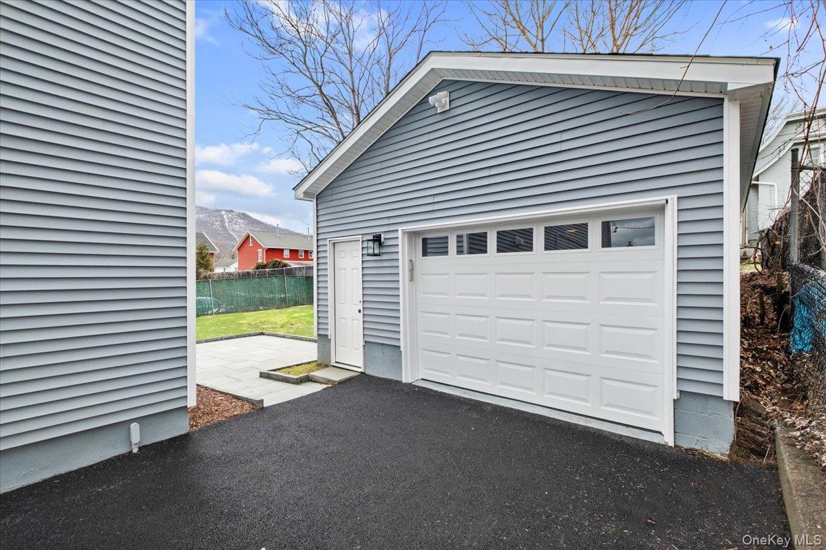 32 Ackerman Street Beacon, NY 12508 - Photo 41 of 50 a view of a house with a backyard and a tub