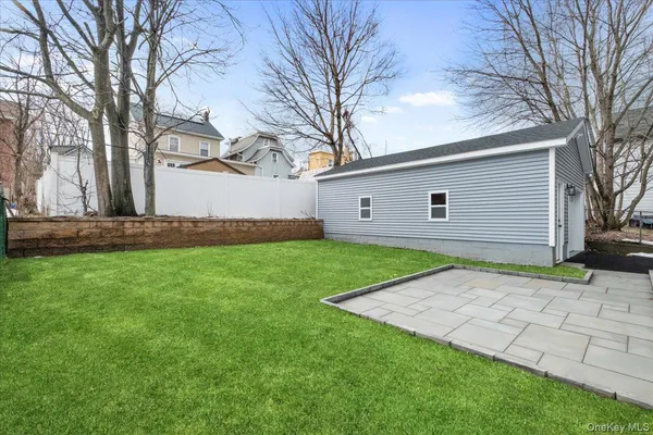 a view of a backyard with a garden