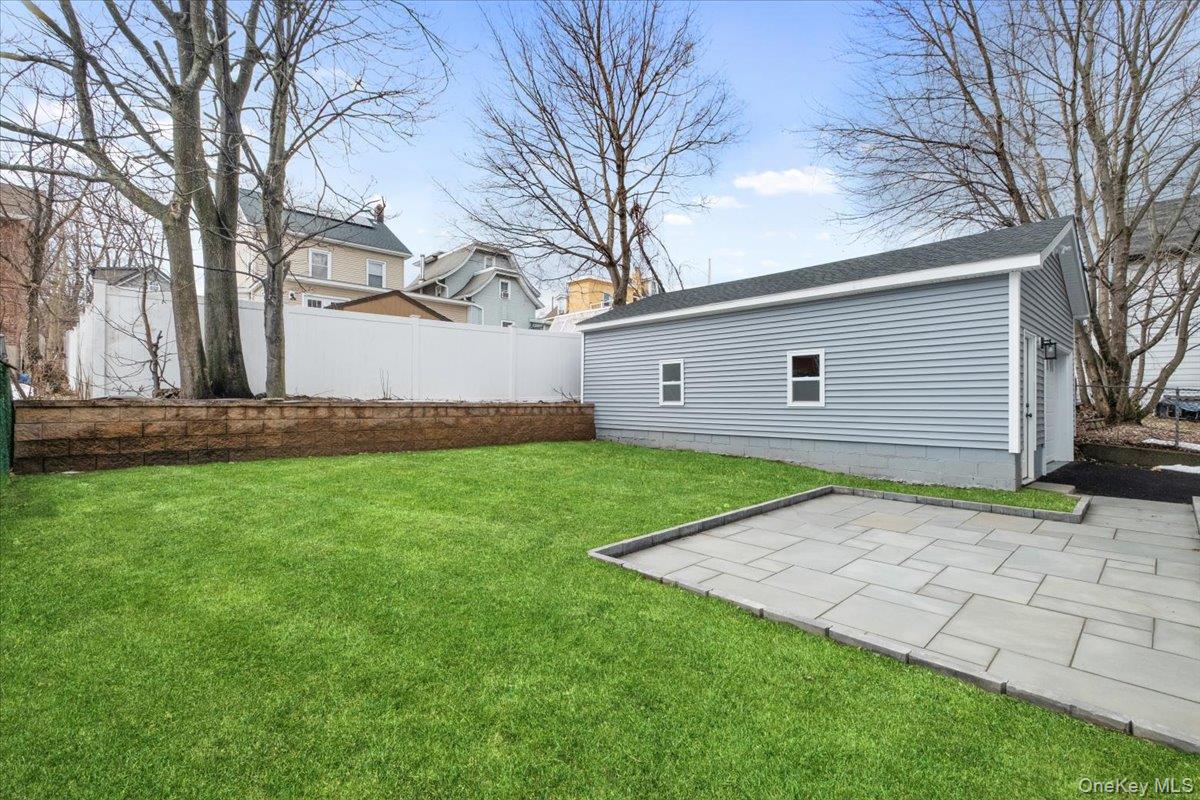 32 Ackerman Street Beacon, NY 12508 - Photo 42 of 50 a view of a backyard with a garden