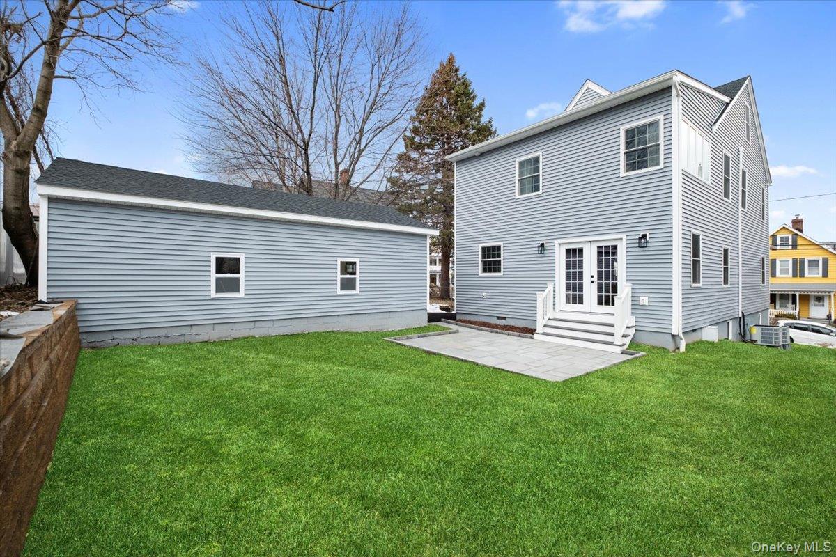 32 Ackerman Street Beacon, NY 12508 - Photo 43 of 50 a view of a backyard with a garden