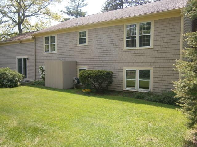 298 Nye Road Centerville, MA 02632 - Photo 13 of 26 front view of a house with a yard