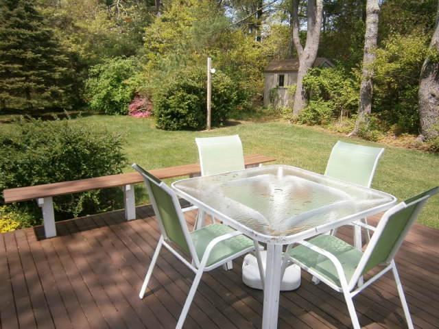 298 Nye Road Centerville, MA 02632 - Photo 14 of 26 a balcony with table and chairs
