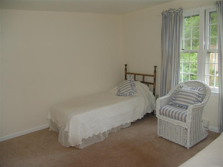 298 Nye Road Centerville, MA 02632 - Photo 22 of 26 a bedroom with a bed and a couch