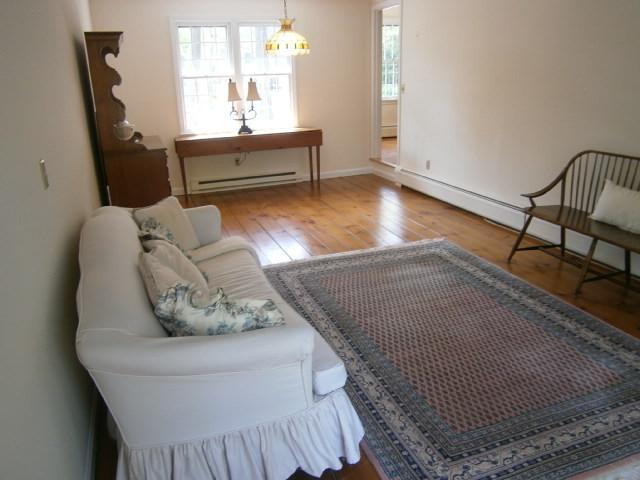 298 Nye Road Centerville, MA 02632 - Photo 9 of 26 a living room with furniture and a mirror