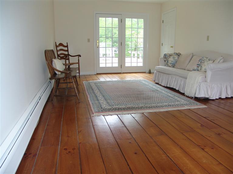 298 Nye Road Centerville, MA 02632 - Photo 10 of 26 a living room with furniture and a rug
