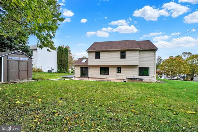 a view of a house with a big yard