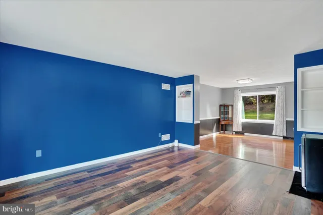 a view of livingroom with hardwood floor and window