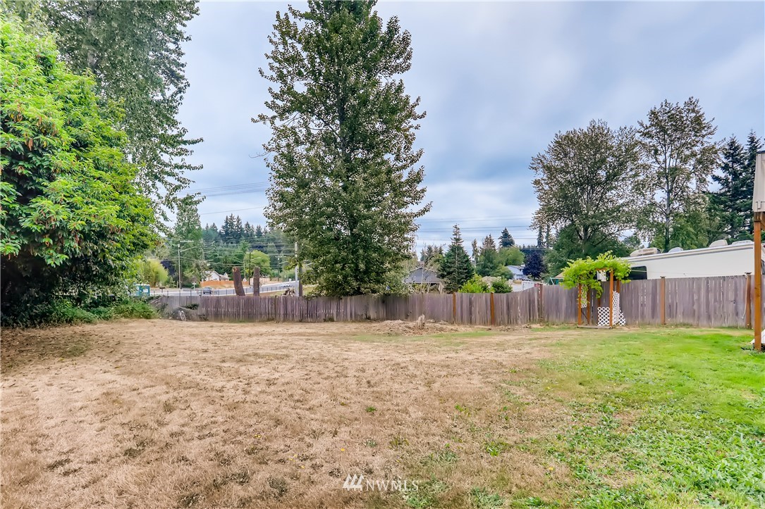 2015 181st Street Southeast Bothell, WA 98012 - Photo 19 of 20 a backyard of a house with lots of green space