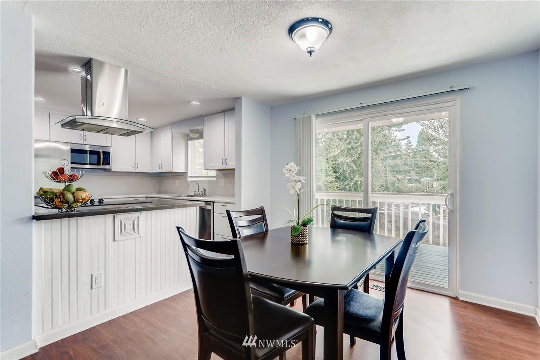 2015 181st Street Southeast Bothell, WA 98012 - Photo 5 of 20 a view of a dining room with furniture window and outside view