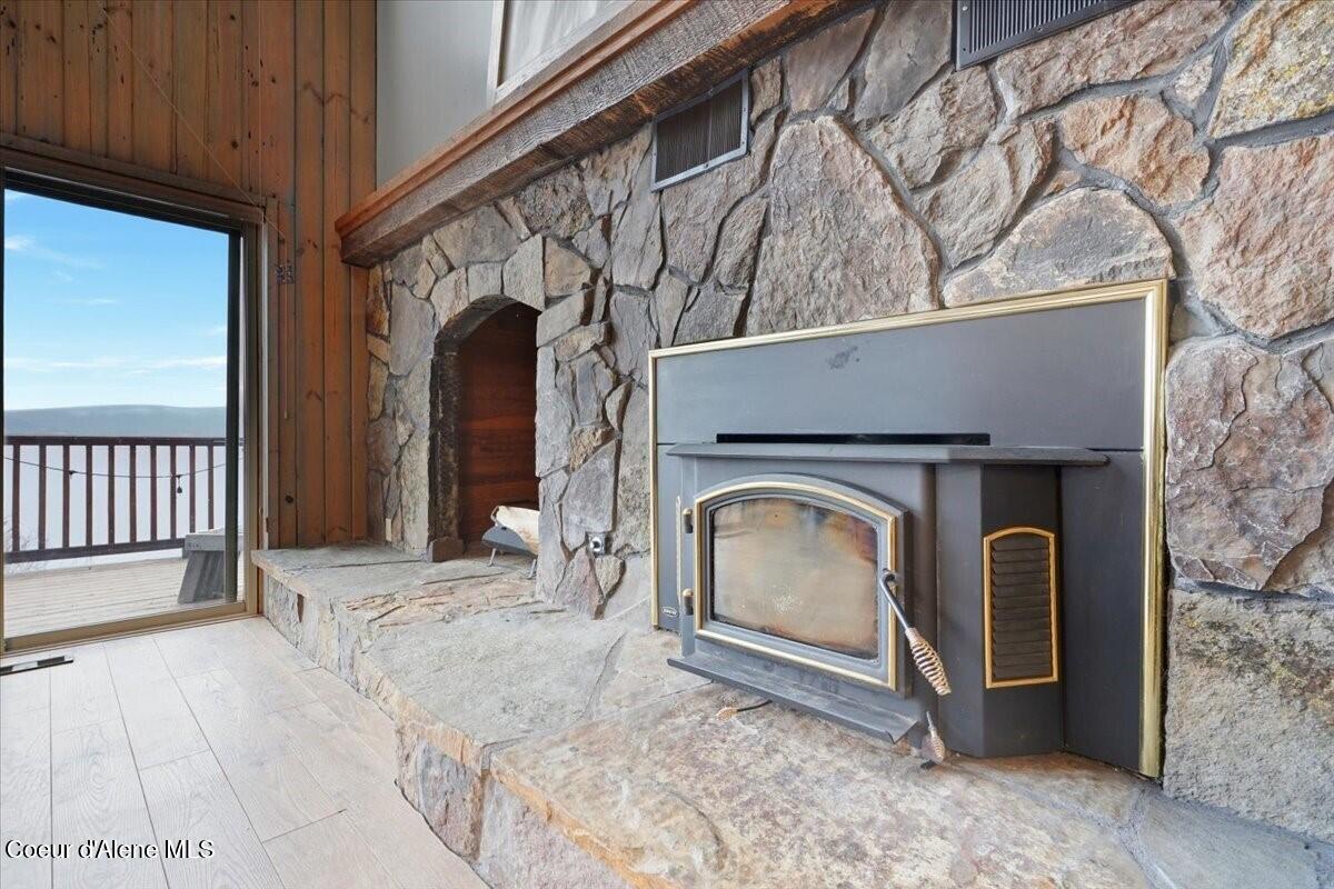 2395 South Silver Beach Road Coeur D'Alene, ID 83814 - Photo 25 of 47 Timeless Living Room Fireplace