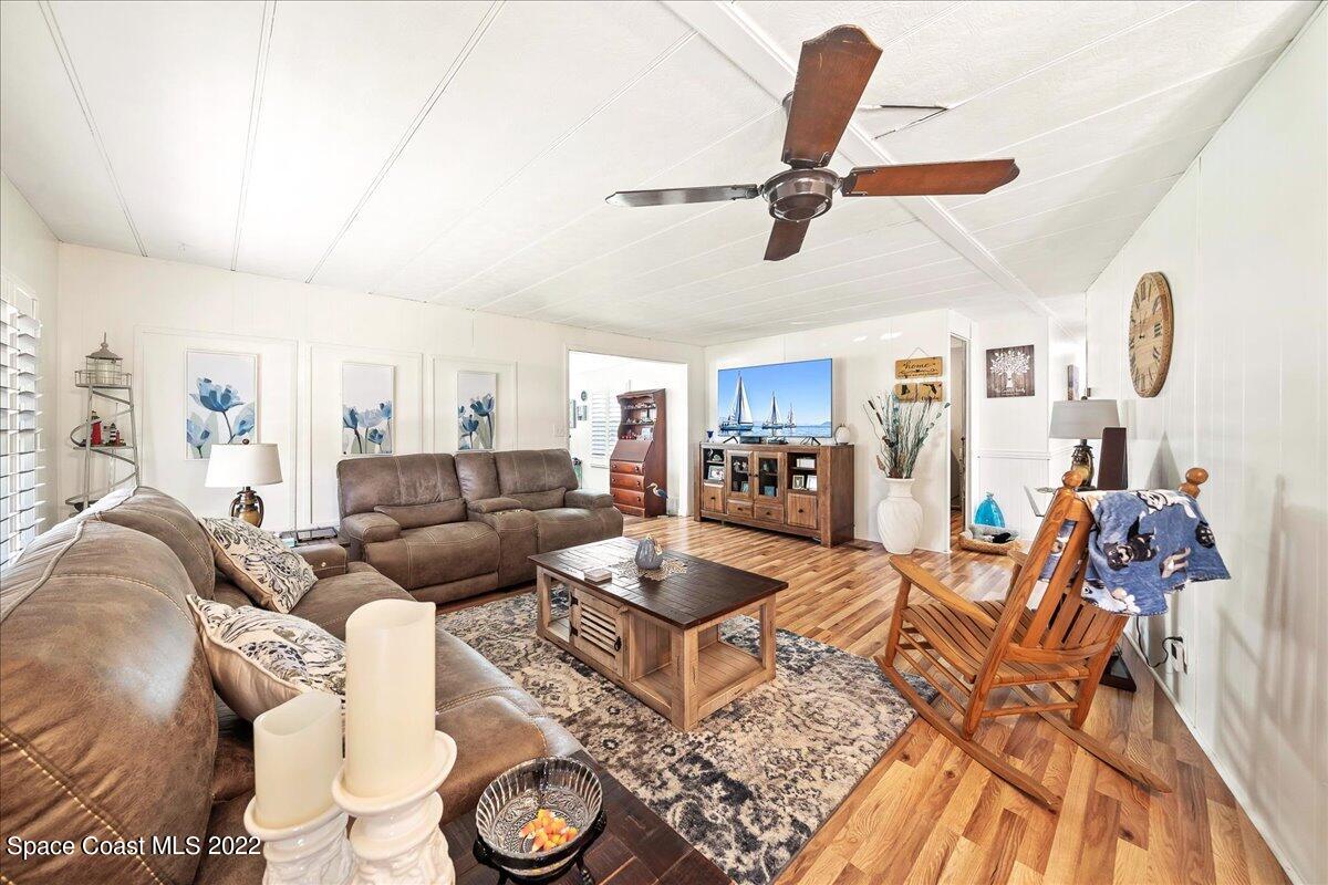 3256 Nancy Avenue Mims, FL 32754 - Photo 15 of 36 a living room with furniture and a window