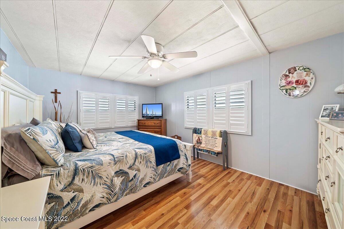 3256 Nancy Avenue Mims, FL 32754 - Photo 20 of 36 a bedroom with a bed and a window