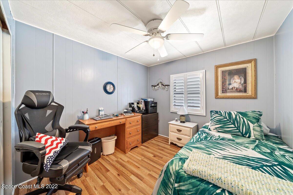 3256 Nancy Avenue Mims, FL 32754 - Photo 26 of 36 a bedroom with furniture and a window