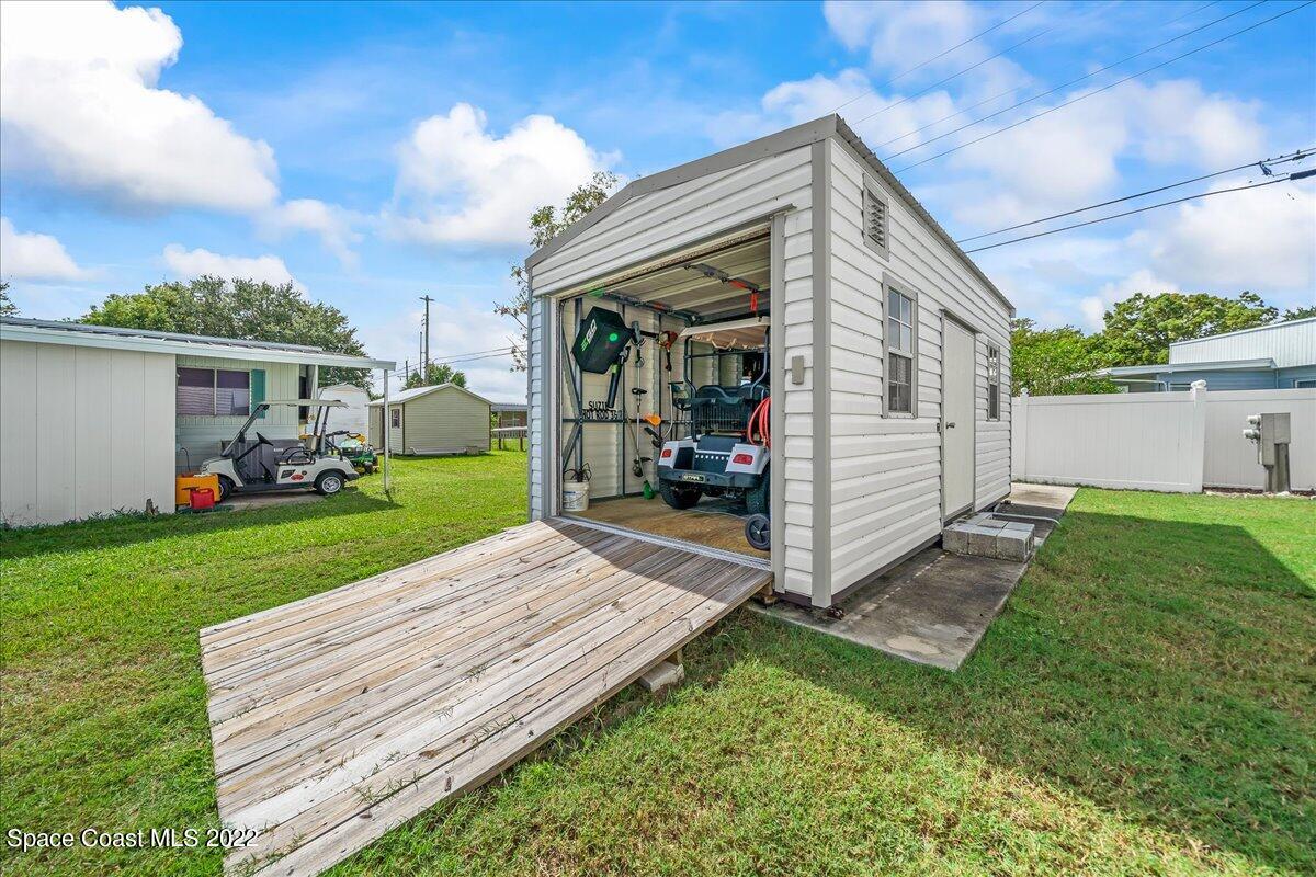 3256 Nancy Avenue Mims, FL 32754 - Photo 32 of 36 a view of a house with a yard
