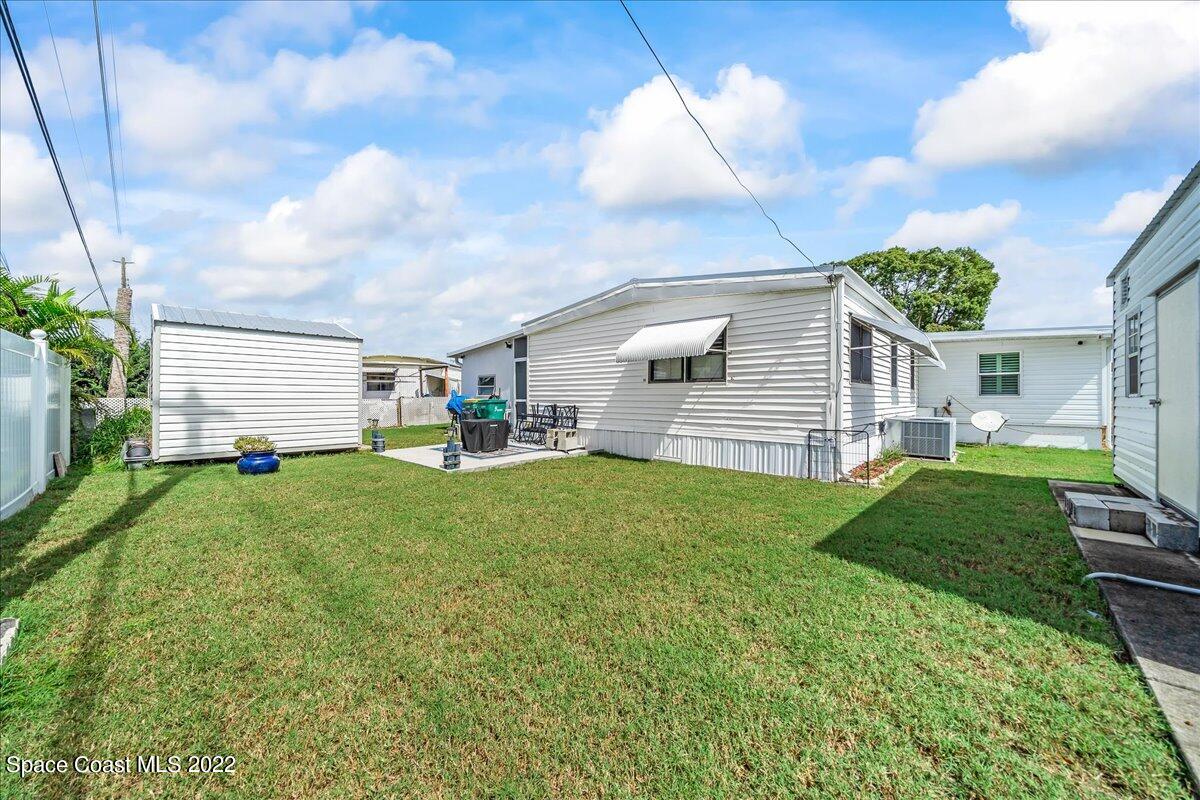 3256 Nancy Avenue Mims, FL 32754 - Photo 33 of 36 a house view with a garden space