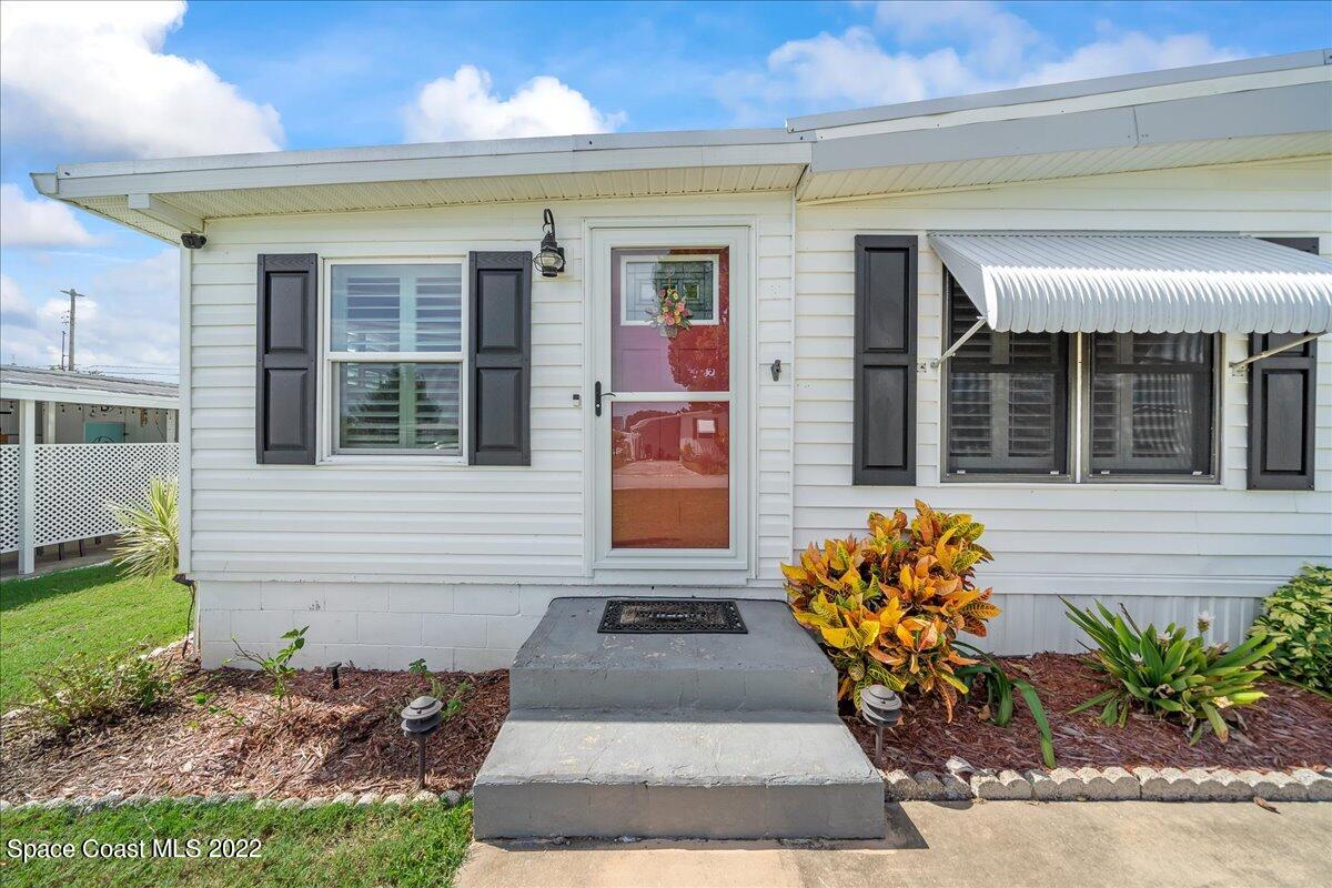 3256 Nancy Avenue Mims, FL 32754 - Photo 4 of 36 front view of a house