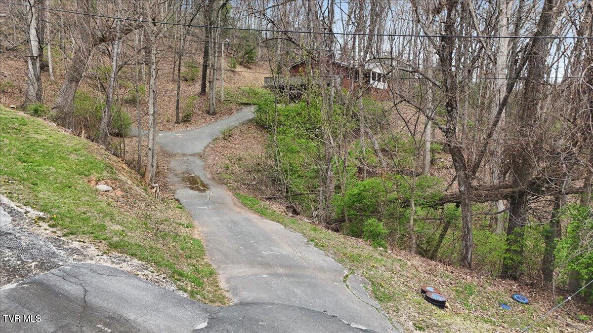 216 Fitzsimmons Hill Road Elizabethton, TN 37643 - Photo 3 of 39 03-DJI_20260326141357_0429_D