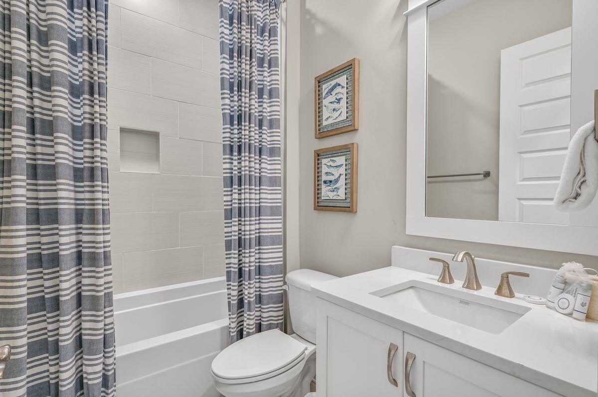 40 Prominence Square Inlet Beach Inlet Beach, FL 32461 - Photo 36 of 37 a bathroom with a sink a toilet and shower