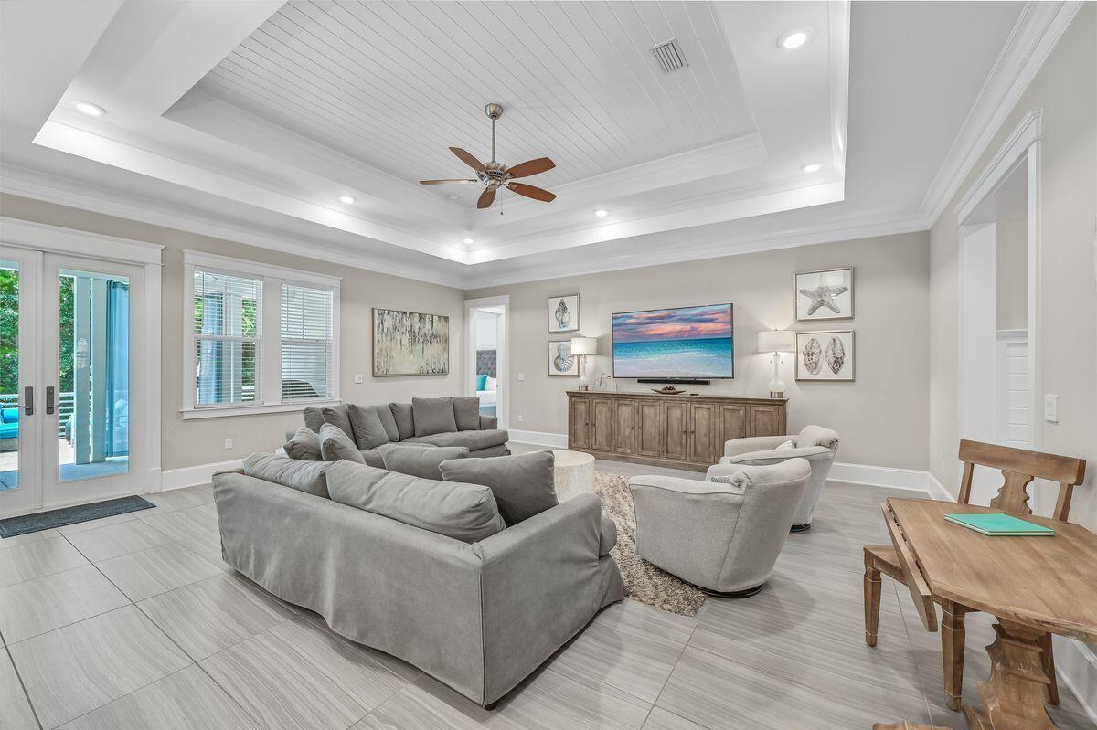 40 Prominence Square Inlet Beach Inlet Beach, FL 32461 - Photo 8 of 37 a living room with furniture and a flat screen tv
