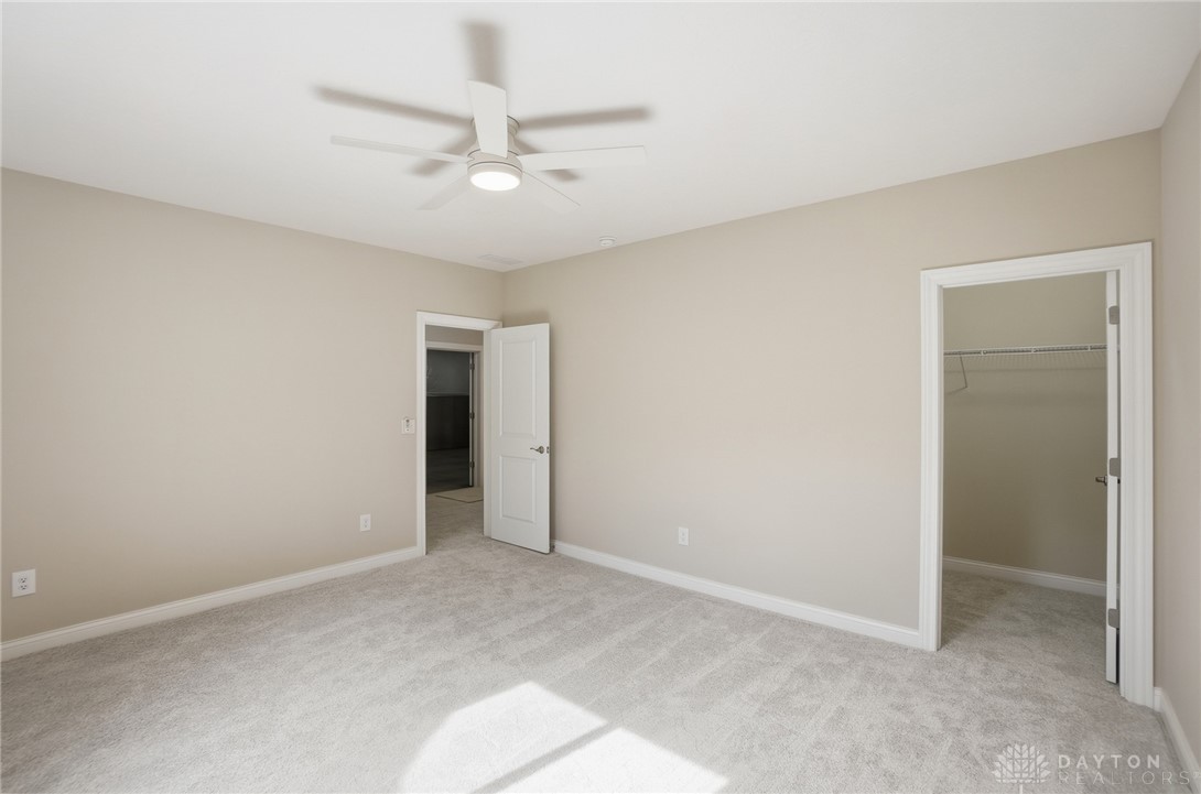 4600 Beal Road Franklin, OH 45005 - Photo 32 of 42 This airy room offers comfort and simplicity, featuring a convenient walk-in closet for ample storage.
