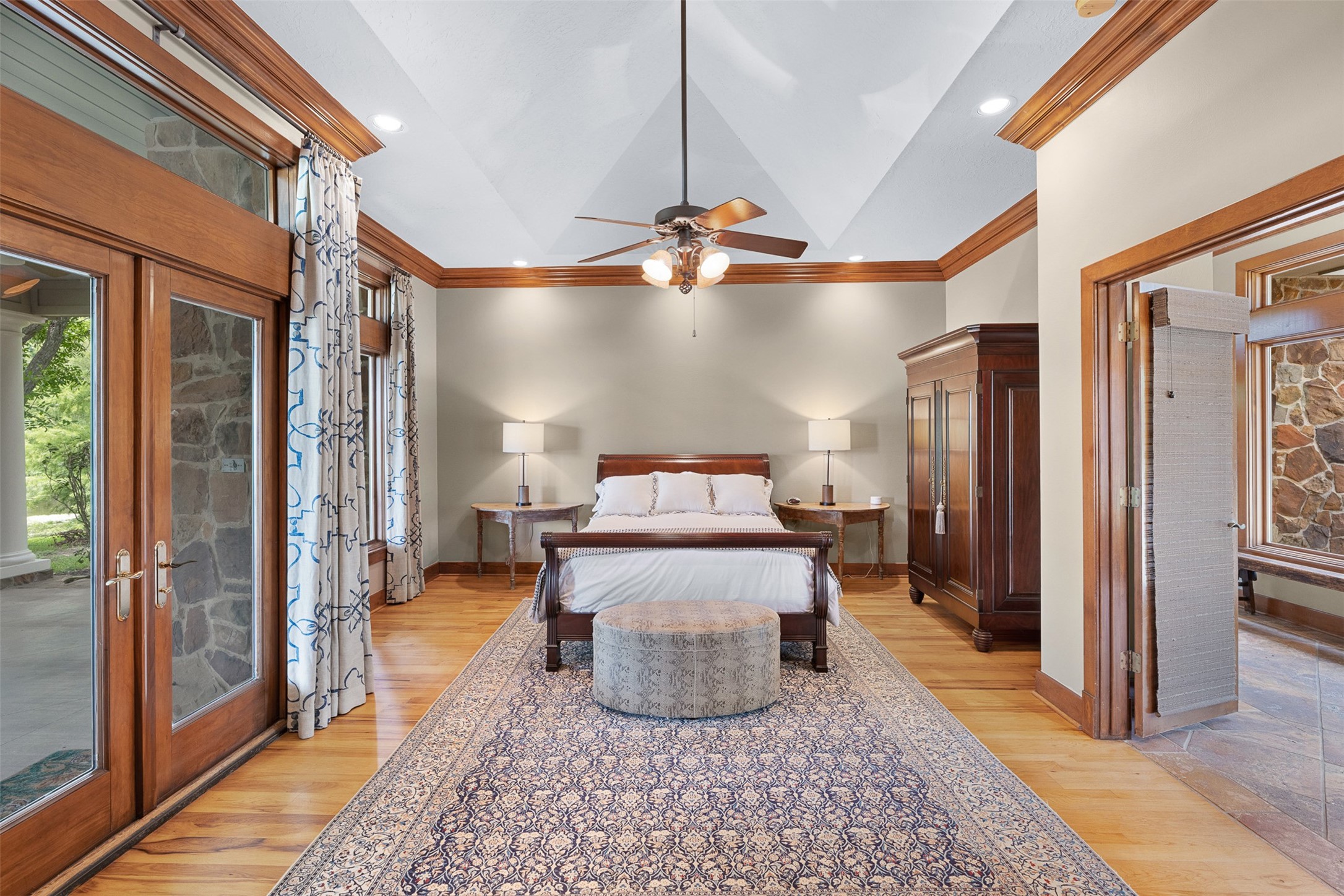 8502 Stansberry Road Wallis, TX 77485 - Photo 24 of 50 The owner’s suite is a restful haven with double glass doors opening to a covered patio, two expertly outfitted walk-in closet.