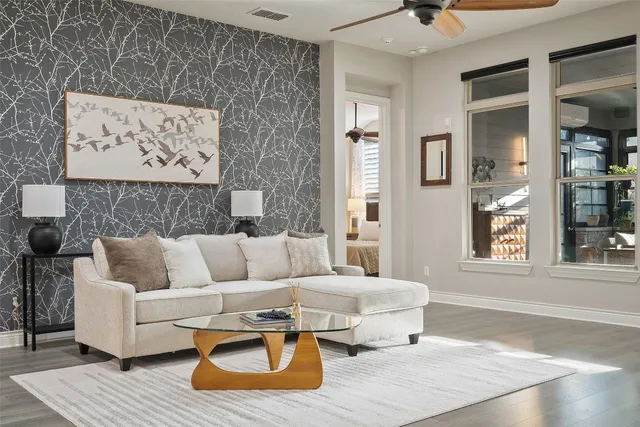 a living room with furniture and a window