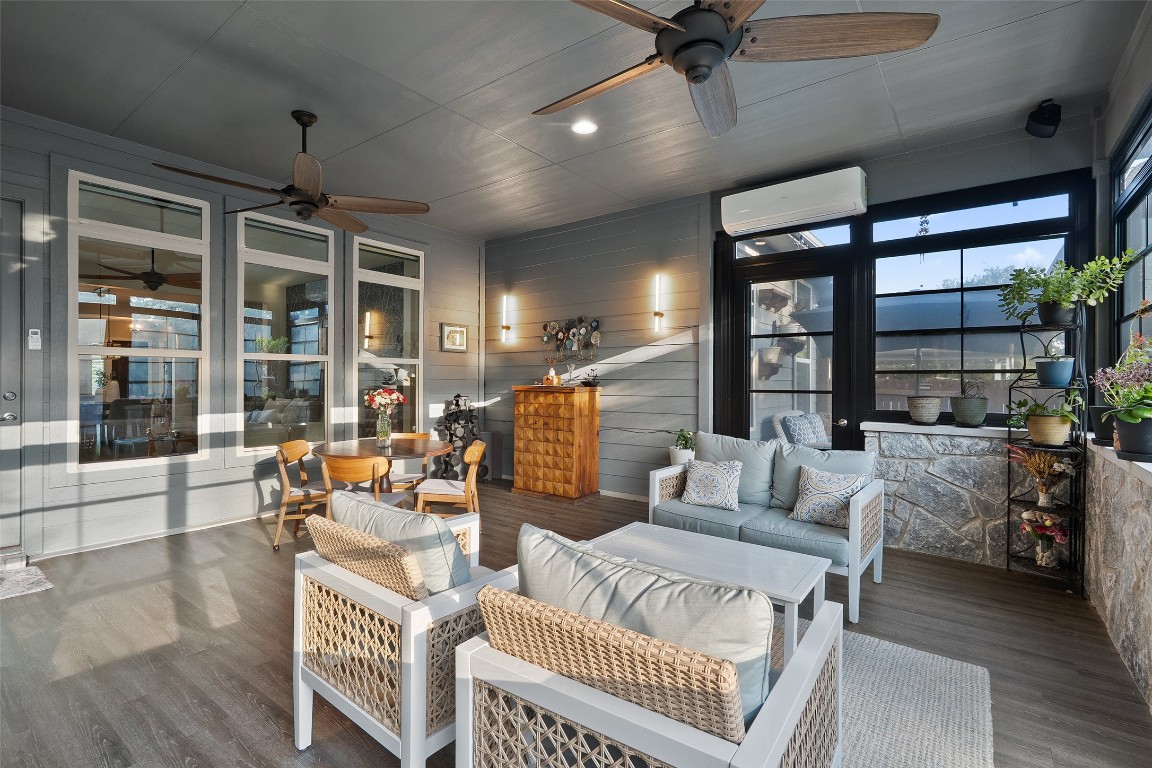 225 Escarpment Way Cedar Park, TX 78613 - Photo 22 of 40 a living room with furniture and a large window