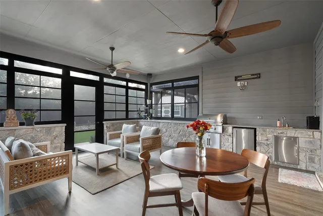 a view of a dining room with furniture window and outside view