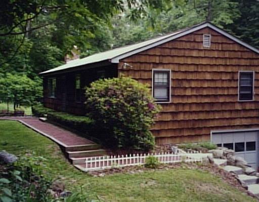 173 Bridle Path Road Southbury, CT 06488 - Photo 1 of 1 a view of a house with a yard