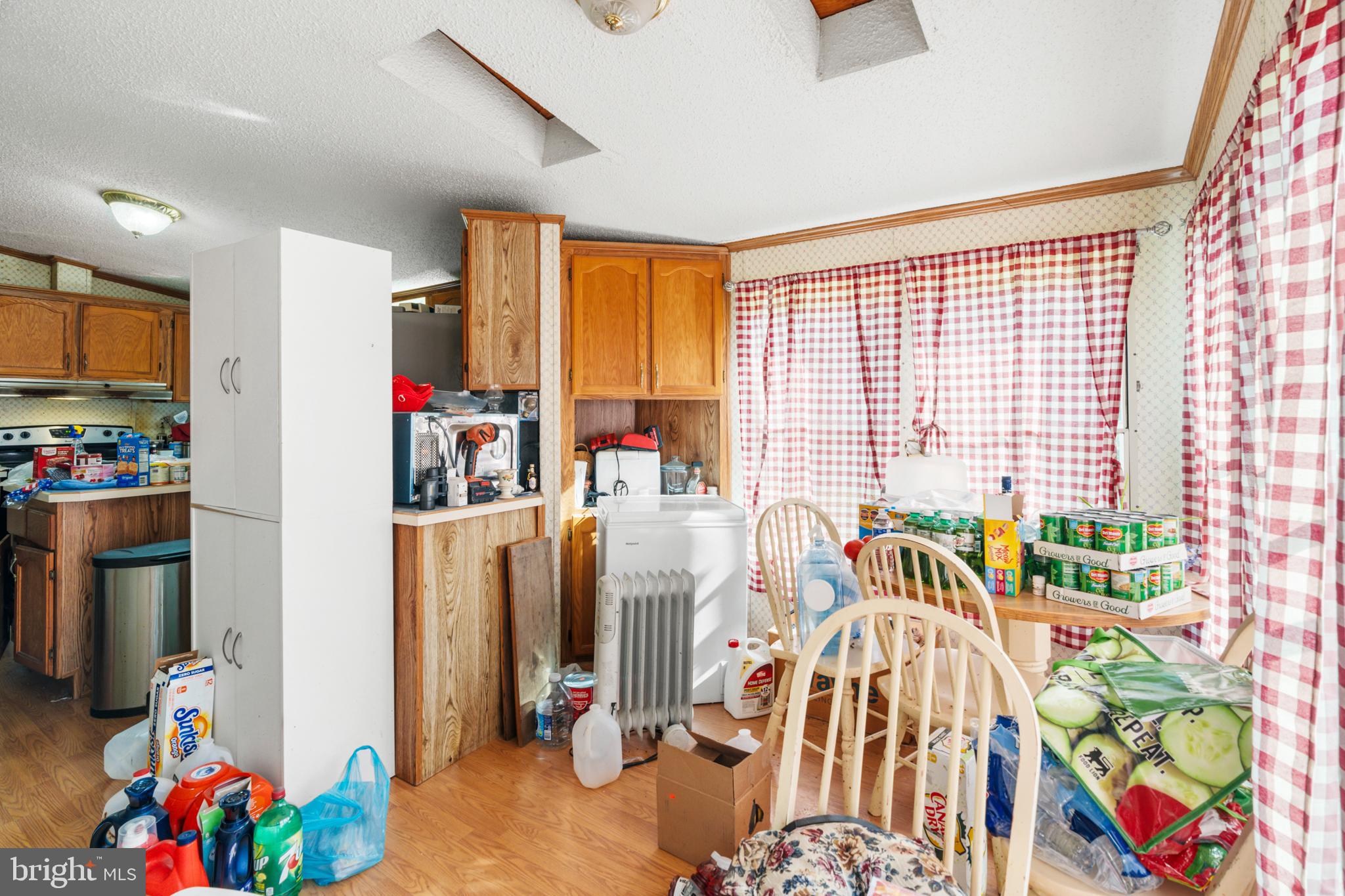 8883 Crooked Run Road Basye, VA 22810 - Photo 11 of 22 a very nice looking room with a large window and couch