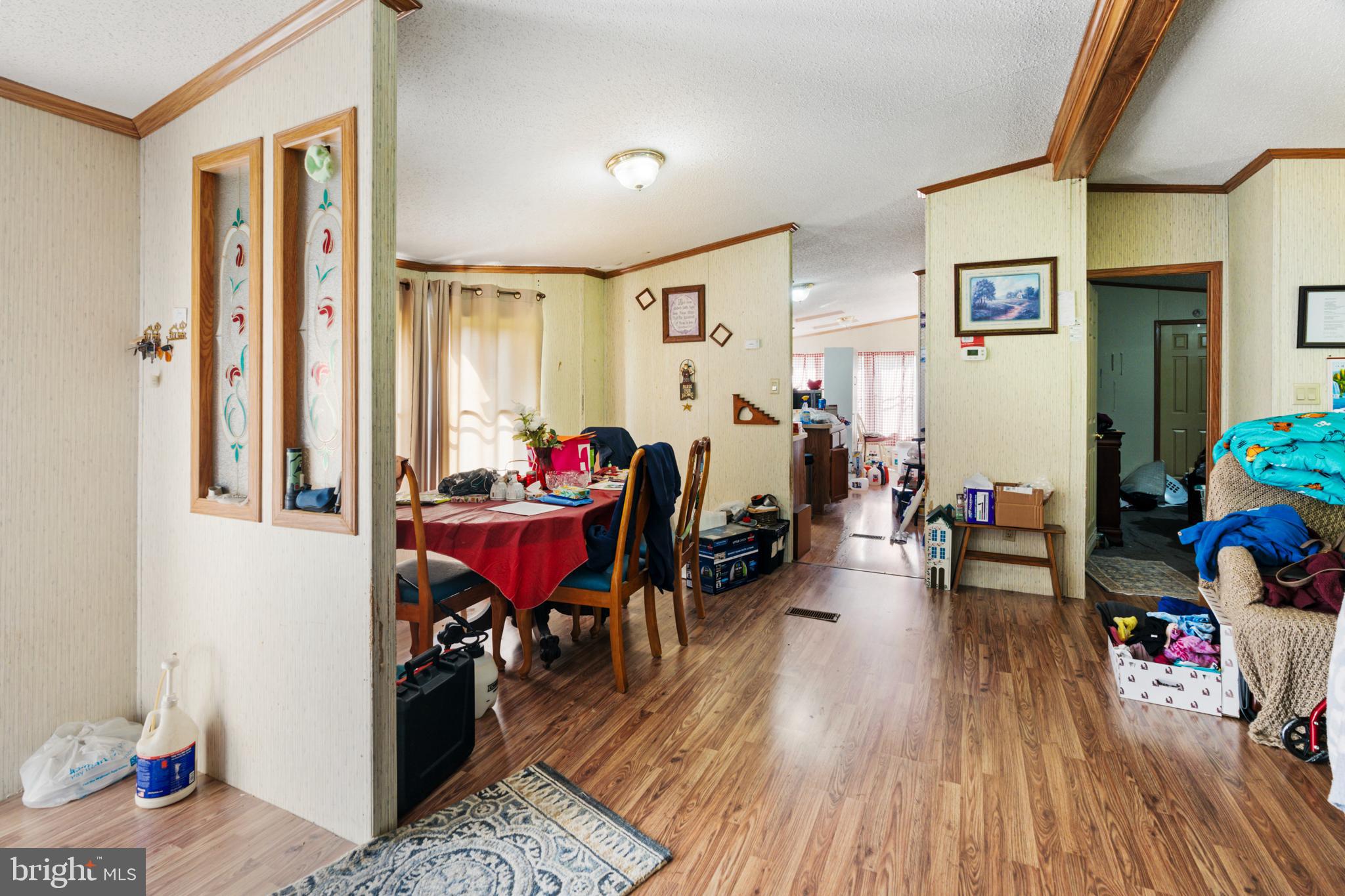 8883 Crooked Run Road Basye, VA 22810 - Photo 15 of 22 a living room with furniture and wooden floor