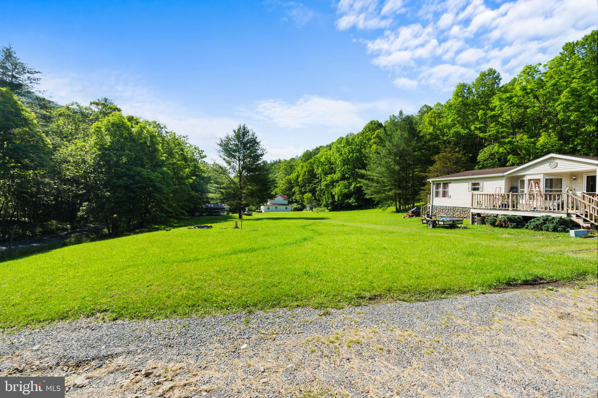 8883 Crooked Run Road Basye, VA 22810 - Photo 5 of 22 a front view of a house with garden