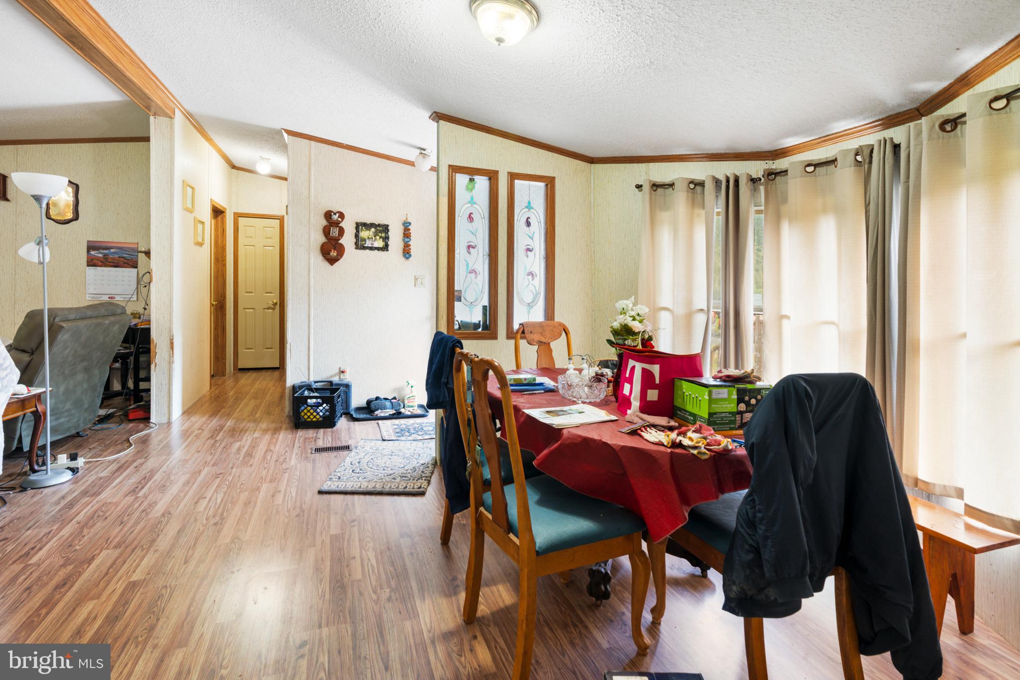 8883 Crooked Run Road Basye, VA 22810 - Photo 9 of 22 a living room with furniture and wooden floor