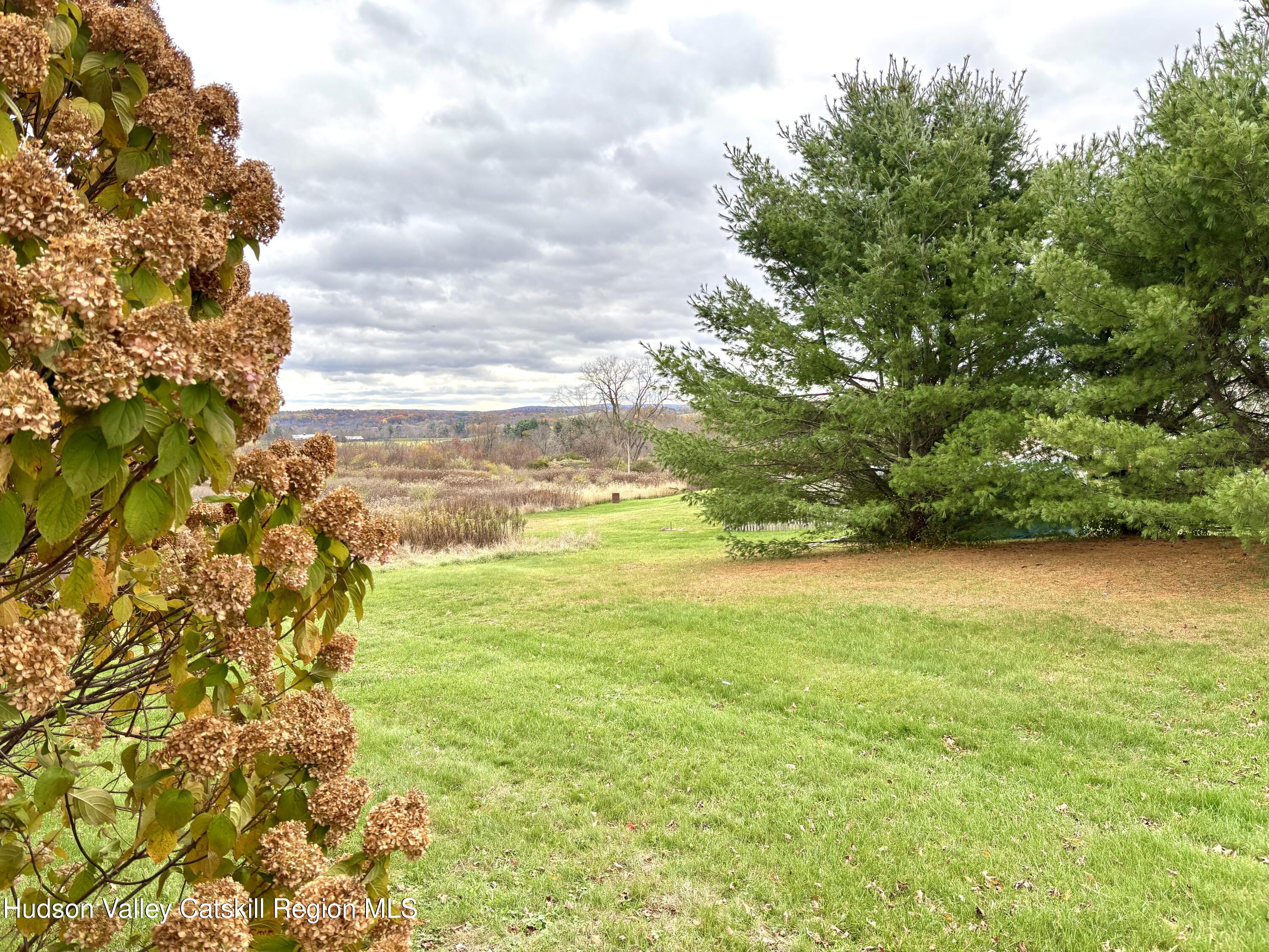 470 County Rte 28B Valatie, NY 12184 - Photo 18 of 20 a view of an ocean and a yard