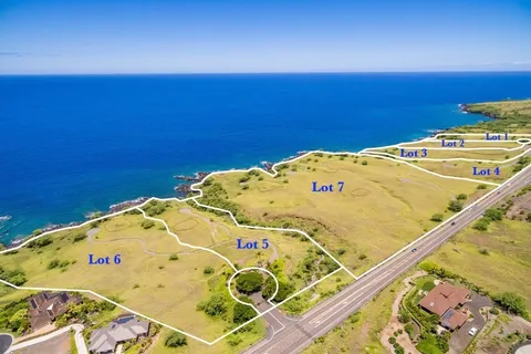a view of a swimming pool with a balcony