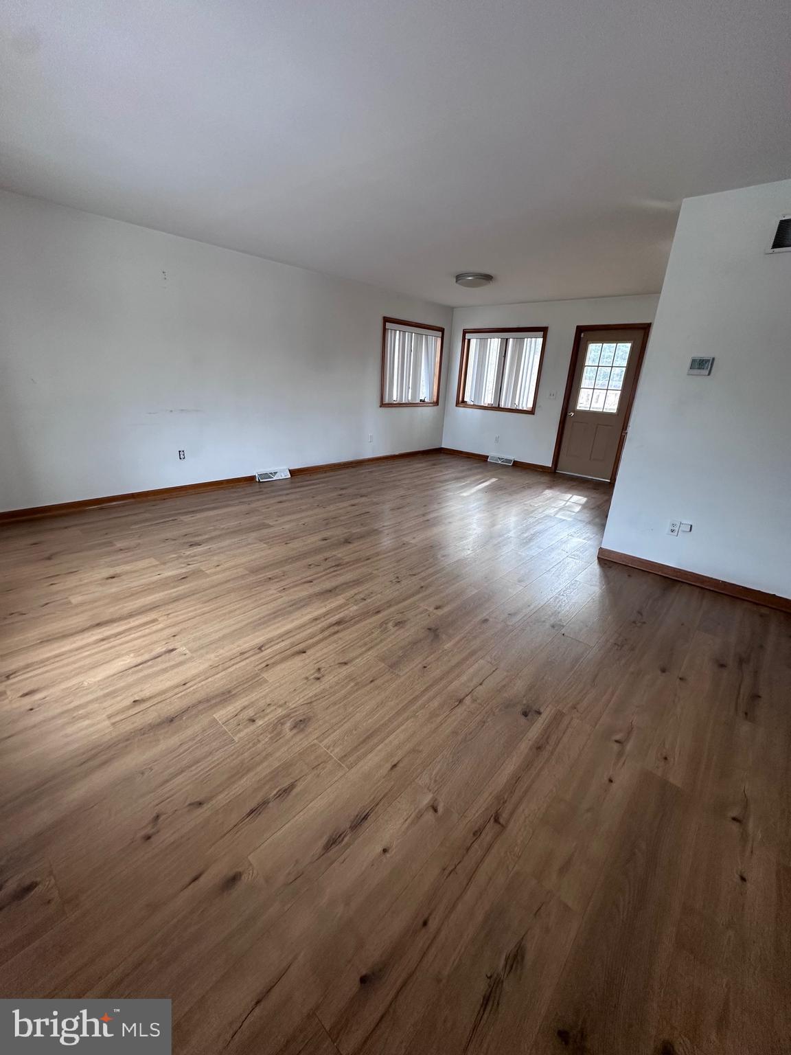 2948 Andrews Lake Road Felton, DE 19943 - Photo 20 of 29 a view of wooden floor and windows in a room