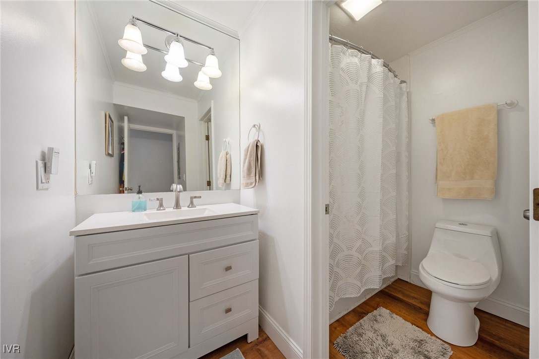 699 Hogan Court, Unit 2 Incline Village, NV 89451 - Photo 12 of 39 a bathroom with a toilet sink and mirror