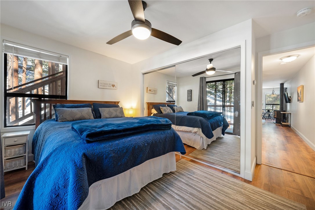 699 Hogan Court, Unit 2 Incline Village, NV 89451 - Photo 21 of 39 a bedroom with furniture and a wooden floor