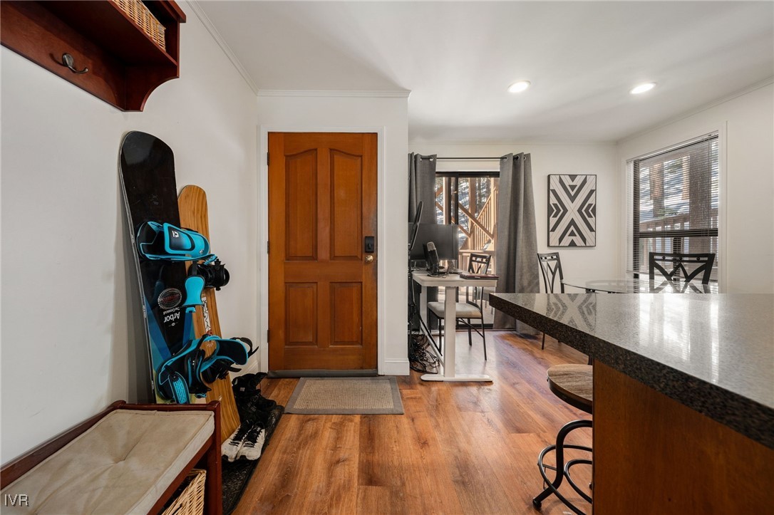 699 Hogan Court, Unit 2 Incline Village, NV 89451 - Photo 29 of 39 a living room with furniture gym equipment and a large window