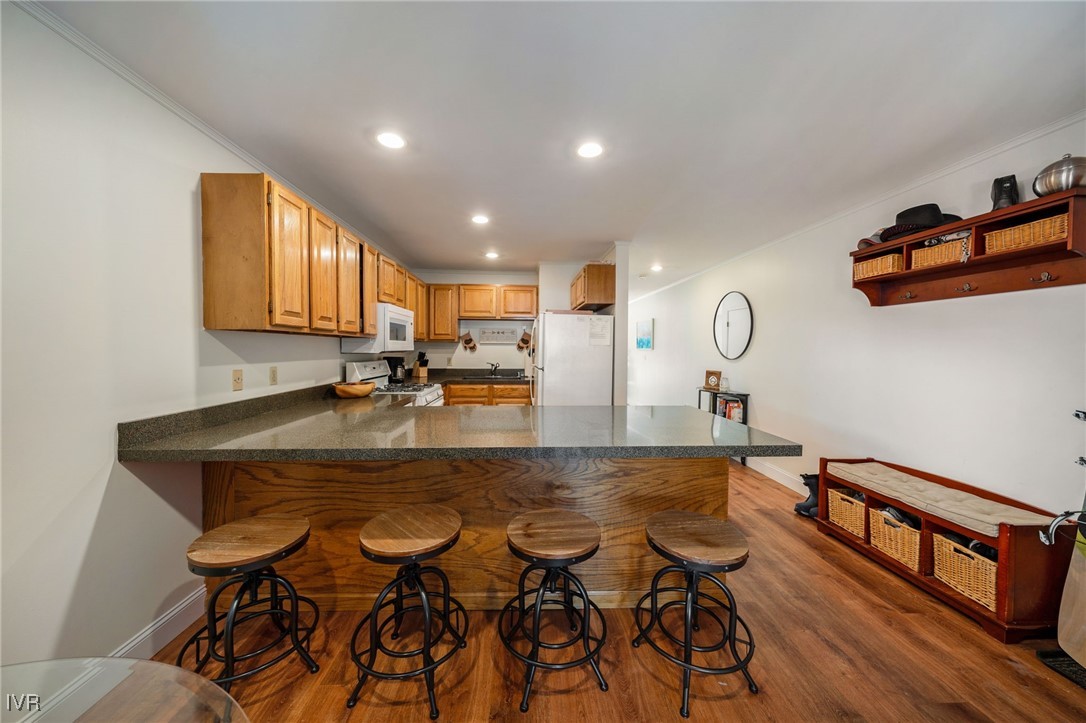 699 Hogan Court, Unit 2 Incline Village, NV 89451 - Photo 31 of 39 a view of a room with chairs and wooden floor