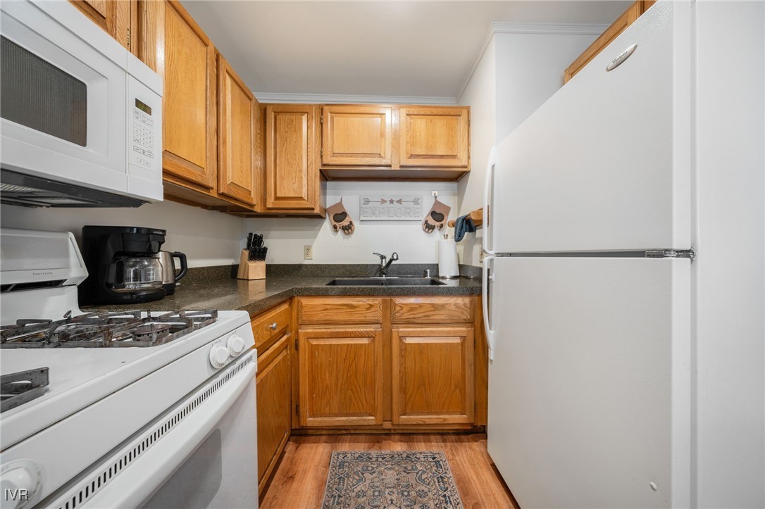 699 Hogan Court, Unit 2 Incline Village, NV 89451 - Photo 4 of 39 a kitchen with stainless steel appliances granite countertop a refrigerator and a stove