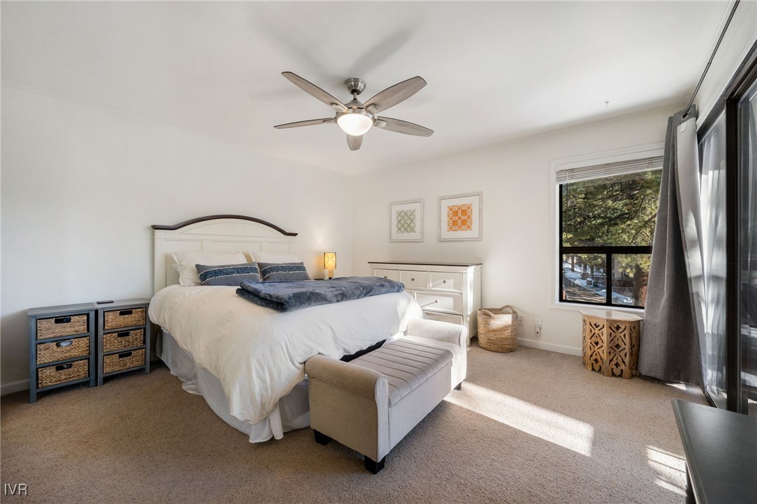 699 Hogan Court, Unit 2 Incline Village, NV 89451 - Photo 10 of 39 a bedroom with a bed couch and window