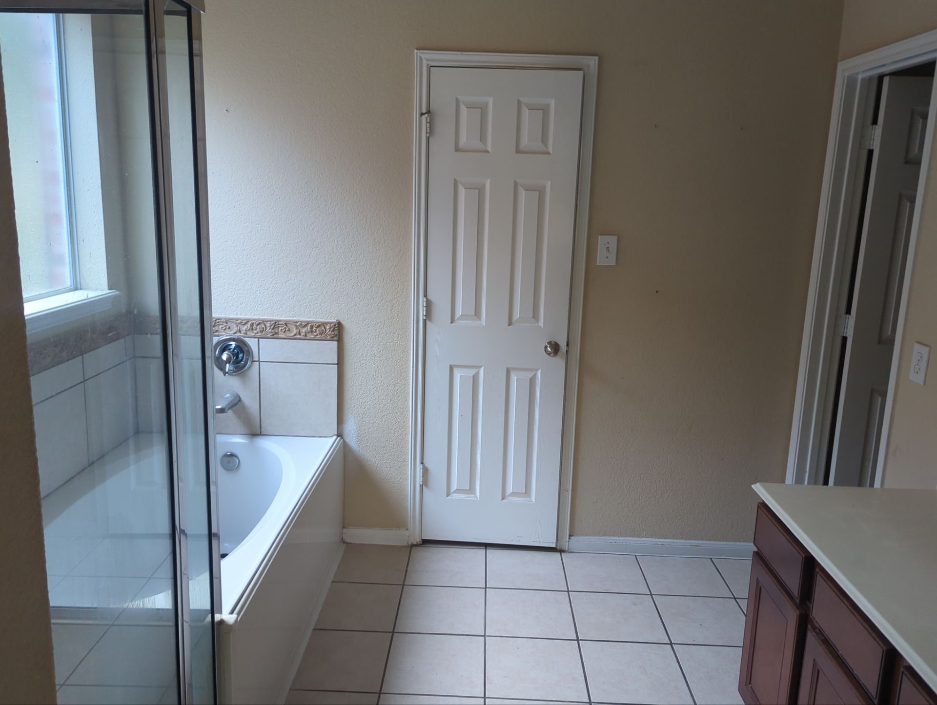 21850 Catoosa Drive Spring, TX 77388 - Photo 11 of 15 a bathroom with a bathtub and a sink