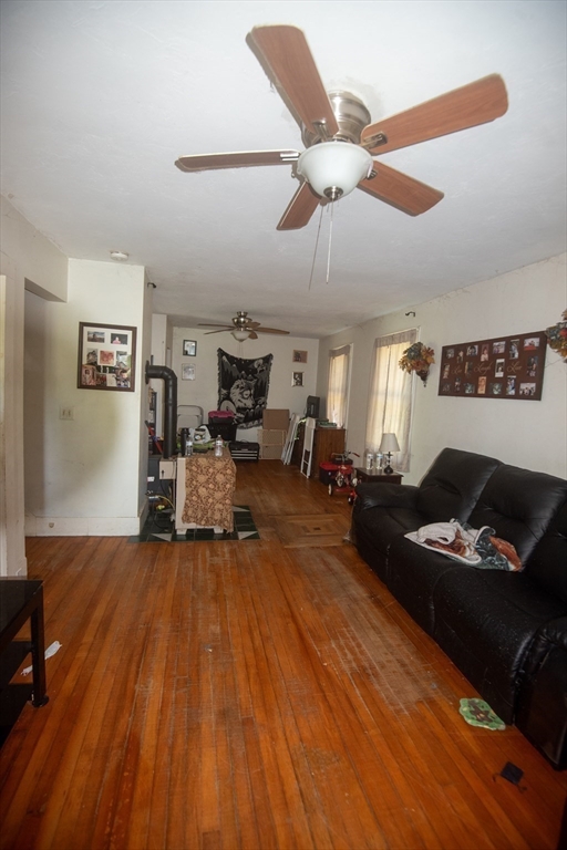 920 Worcester Road Barre, MA 01005 - Photo 30 of 40 a living room with furniture and a wooden floor