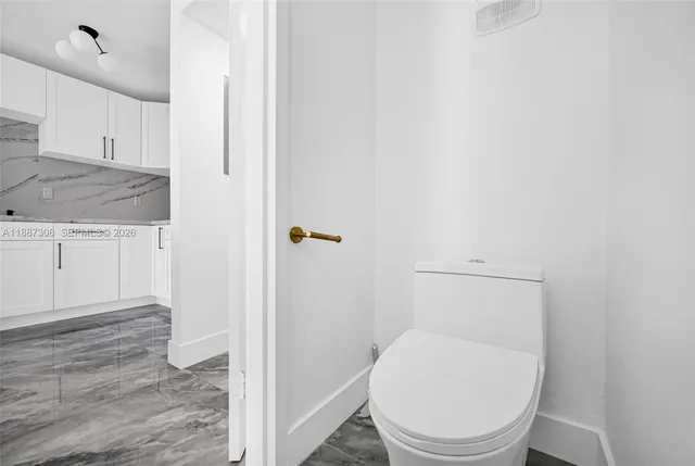 a bathroom with a sink a mirror and shower view