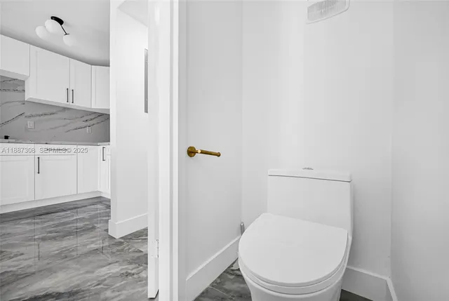 a bathroom with a sink a mirror and shower view