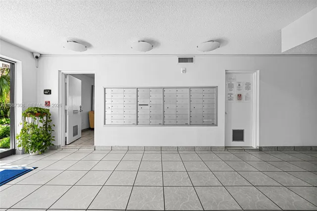 a view of a garden with a building