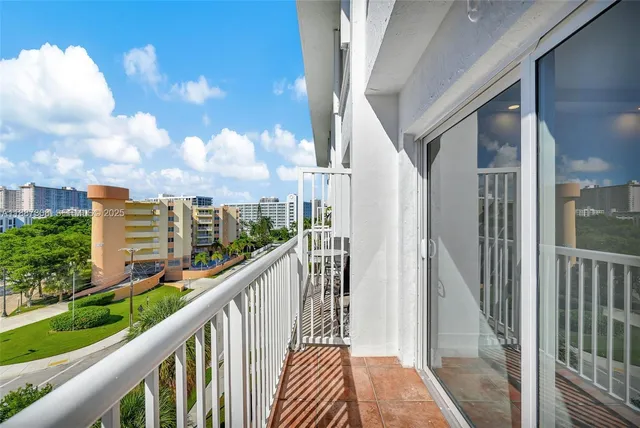 a view of a swimming pool with an outdoor seating