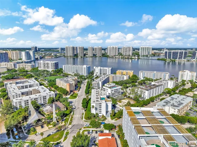 a view of a city with tall buildings